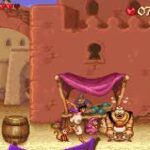 Vivid image of Aladdin escaping in a vibrant desert city scene.