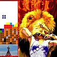 Lion and tiger themed puzzle game with a girl celebrating victory.
