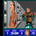 Classic Wolfenstein 3D first-person shooter game scene with Nazi enemies and pixelated graphics.