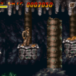 Classic Castlevania gameplay with skeleton enemies and eerie cave background.