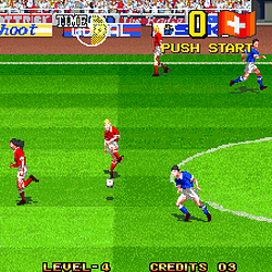 Classic soccer video game gameplay screenshot showing players in action.