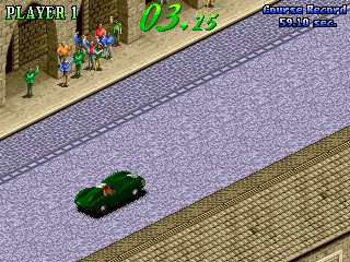 Vintage arcade racing game screenshot with a green car on a city street.