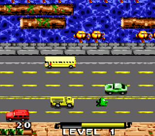 Classic Frogger Deluxe game scene with vehicles and frog crossing the road.