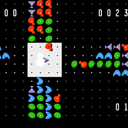Classic arcade game Zoop with colorful shapes and a central character.