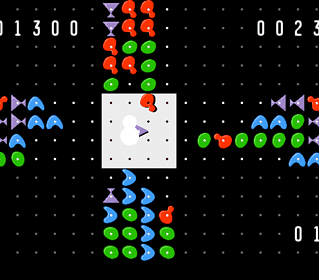 Classic arcade game Zoop with colorful shapes and a central character.