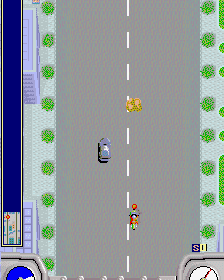Classic arcade racing game screenshot featuring a race car and a motorcycle on a city street.