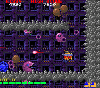 Retro space shooter game with alien enemies and spaceship in action.