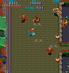 Street Fighter II arcade game screenshot with fighting characters.