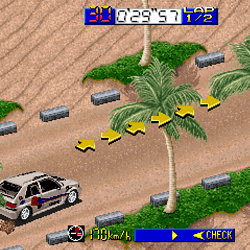 Racing game screenshot with cars, palm trees, and track obstacles.