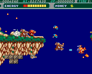 Retro arcade game with spaceships and enemies in space.