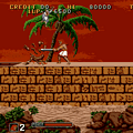 Jungle Warrior Adventure game scene with hero fighting a crocodile under a palm tree.