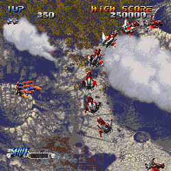Battle Squadron arcade game screenshot with fighter jets and enemy aircraft.