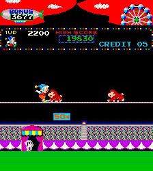 Classic Super Mario Bros. arcade game with Mario jumping on enemies.