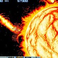 Classic arcade space shooter game with spaceship and fiery sun.