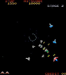 Classic Galaga arcade game screenshot with ships and enemies.