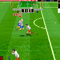 Soccer video game screenshot showing players in white uniforms competing on a green field.