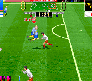 Soccer video game screenshot showing players in white uniforms competing on a green field.