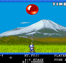 Mount Fuji Adventure game screenshot with a mountain, a red ball, and a character aiming at the ball.