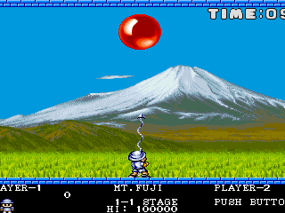 Mount Fuji Adventure game screenshot with a mountain, a red ball, and a character aiming at the ball.