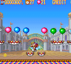 Classic Super Mario World game scene with Mario jumping over enemies at the castle.