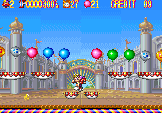 Classic Super Mario World game scene with Mario jumping over enemies at the castle.
