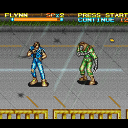 Classic arcade fighting game featuring characters like Flynn and an alien opponent.