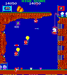 Arcade game screenshot featuring Mario jumping to avoid enemies and collect coins in a classic platf.