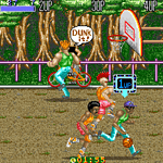 Arcade basketball game with players and a cyclist in a park setting.