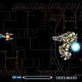 Gameplay screenshot of a space shooter game with spaceship and enemy robot.
