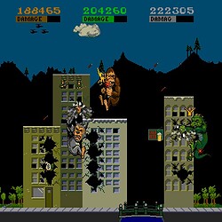 Arcade game featuring Godzilla and King Kong battling in a cityscape.