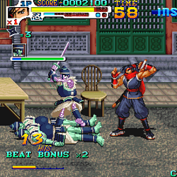 Arcade game screenshot from Street Fighter II showing characters in combat.