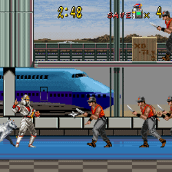 Gameplay scene from Streets of Rage 2 featuring characters fighting on a city street with a train in.