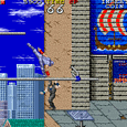 Gameplay scene from a classic arcade game with city background and character in action.