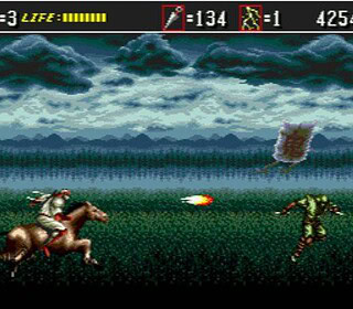 Classic 16-bit action game with characters fighting in a field.