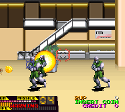 Battle City tank game gameplay with two tanks shooting in a factory setting.