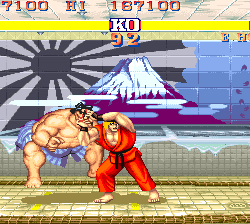 Ryu and Ken battling in Street Fighter II arcade game scene.