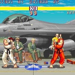 Fighting game scene featuring Ryu and Ken in front of a fighter jet aircraft.