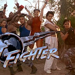 Street Fighter group celebration scene with diverse fighters outdoors.