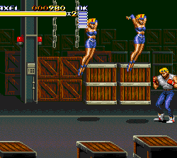 Street Fighter II arcade game scene with characters fighting and jumping.
