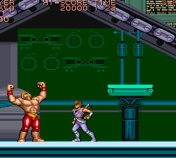 Iconic Street Fighter II character Ryu in a fighting stance against a muscular opponent.