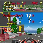 Vintage racing game screenshot showing a car dashboard and track view.