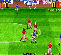 Classic soccer game with players in red and blue jerseys on a green field.