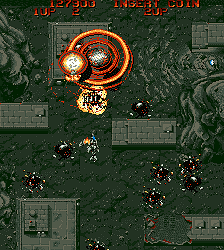 Classic arcade game screenshot with spaceship shooting enemies.