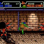 Teenage Mutant Ninja Turtles arcade game screenshot with turtles fighting enemies.