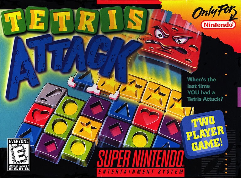 Tetris Attack game cover for Super Nintendo with colorful blocks and characters.