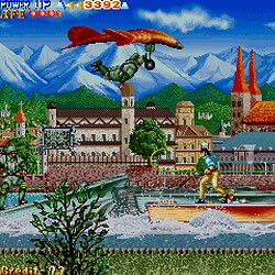 Retro arcade game scene with characters and a dragon in a colorful landscape.