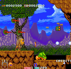 Classic Lion King jungle adventure game screenshot with lion, crocodile, and tropical background.