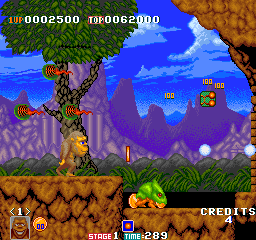 Classic Lion King jungle adventure game screenshot with lion, crocodile, and tropical background.
