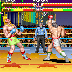 Arcade fighting game scene with two fighters in a boxing ring at night.