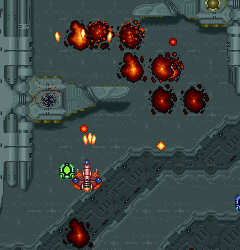 Gameplay screenshot of a classic arcade shooter game with spaceship and explosions.